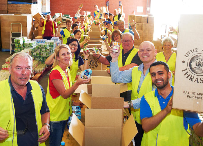 Teams giving back their staff christmas team building activities is packing food hampers for worth causes and homeless families in Sydney, Gold Coast and Brisbane