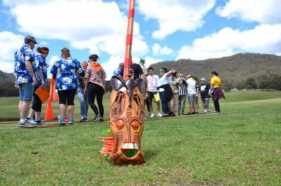 Survivor Team Building activities and the best staff group games in Parramatta with the Immunity Idol African Mask to win