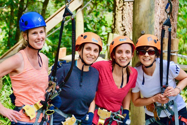 Ropes Course beneath the Tree Tops ladies staff and employee group bonding on adventure team building activities in Sydney